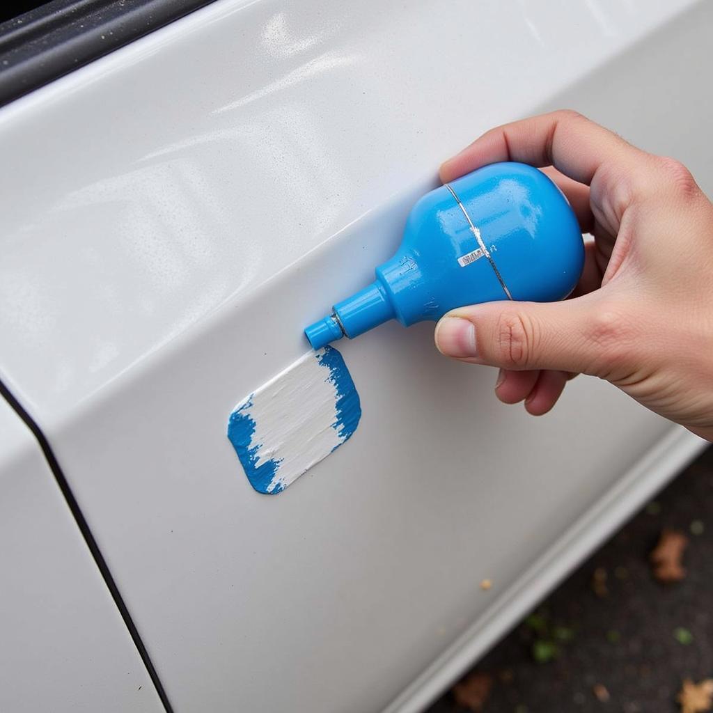 Applying Touch-Up Paint to Car Chip