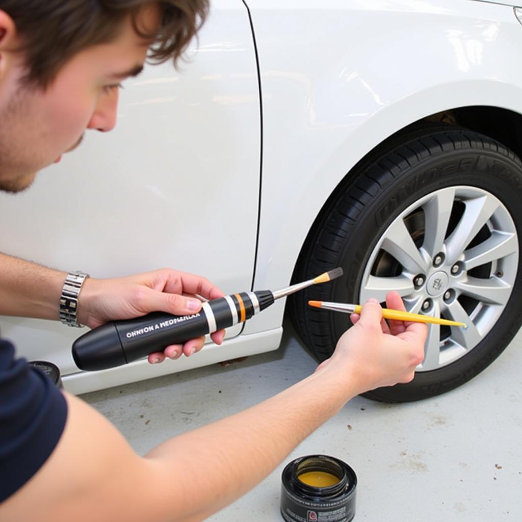 Applying Touch-Up Paint to a Deep Scratch on Car Plastic