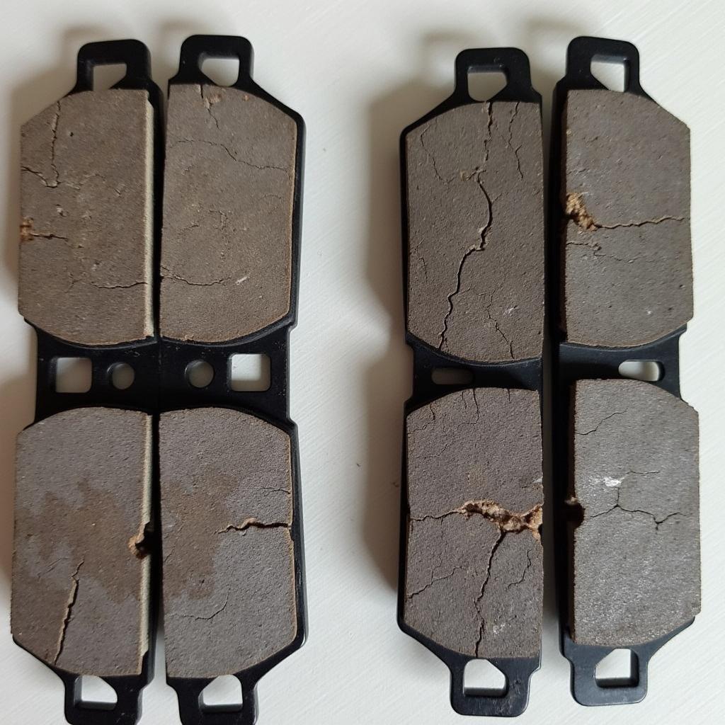 Worn-out brake pads compared to new brake pads in Anchorage