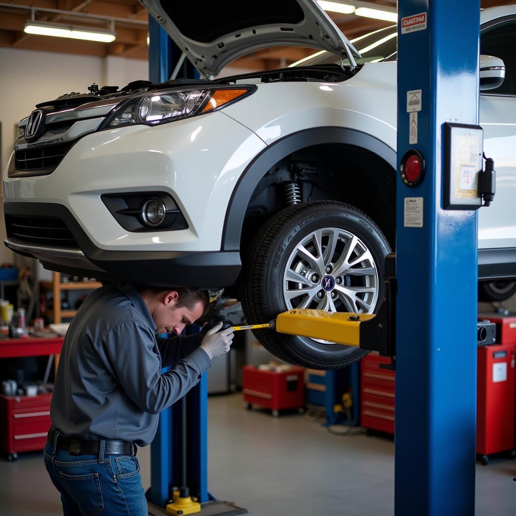 Car Getting Oil Change at Service Center