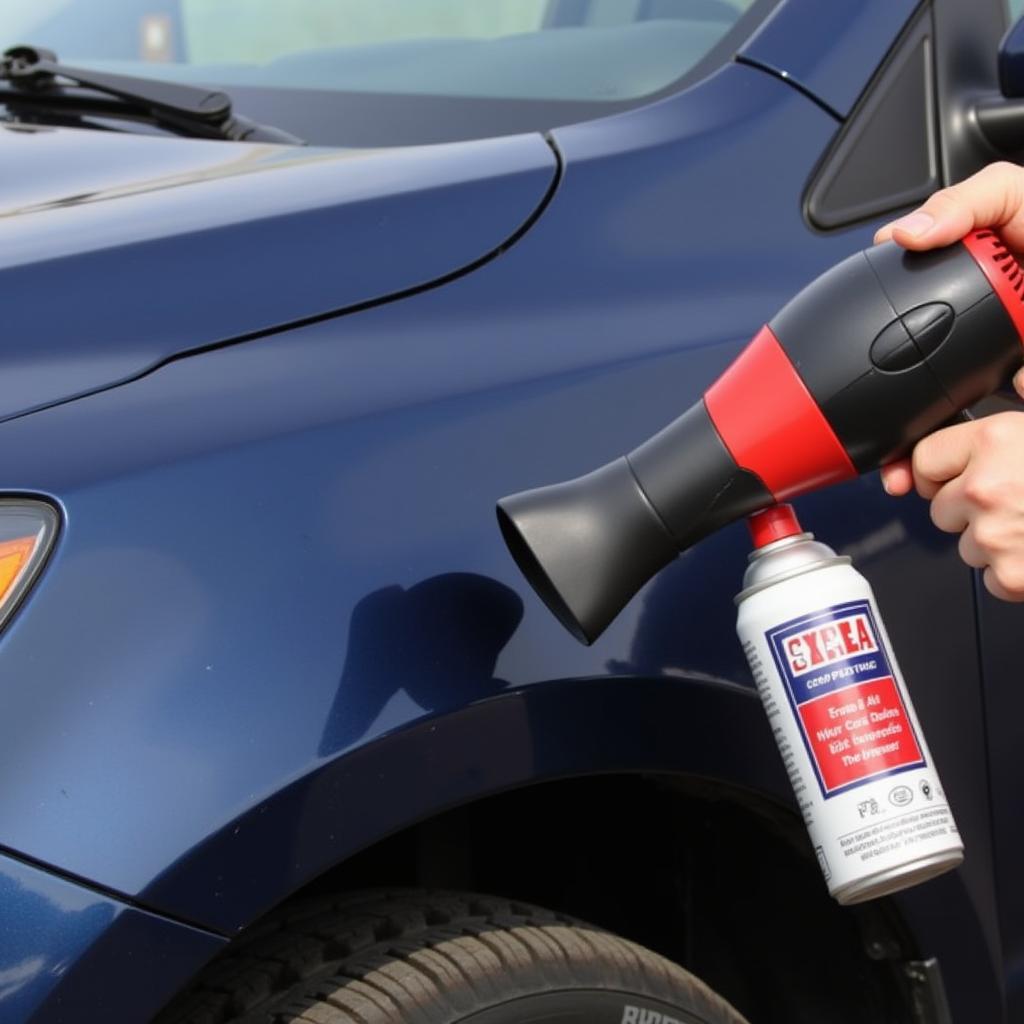 Repairing a dent with a hair dryer and compressed air