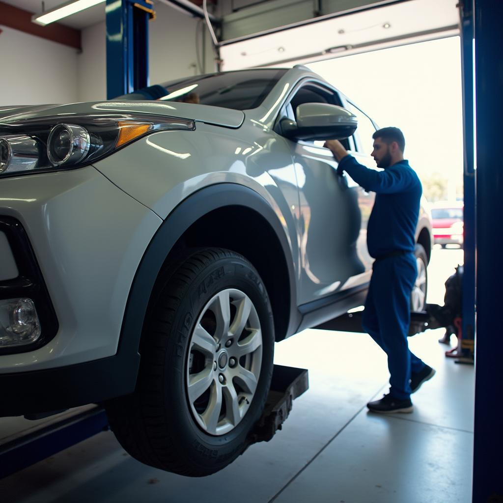 Car undergoing preventative maintenance at a Nash auto service