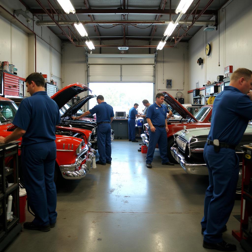 Car repair shop in New Orleans with mechanics working on a vehicle