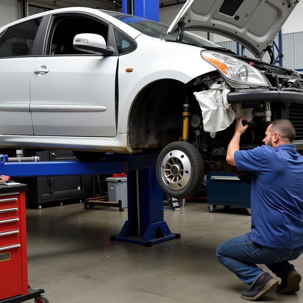 Professional car chassis repair in a specialized shop