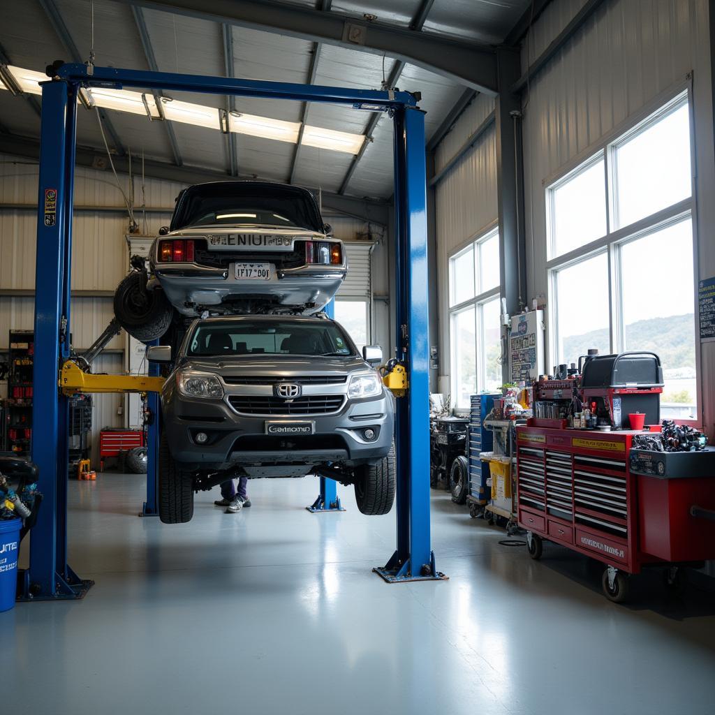 Rotorua auto service centre with a car on a lift