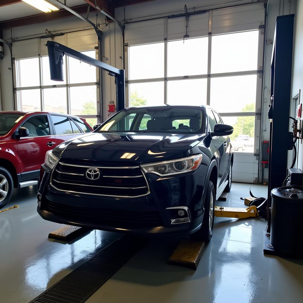 Car undergoing routine maintenance at Al-An's Auto Service