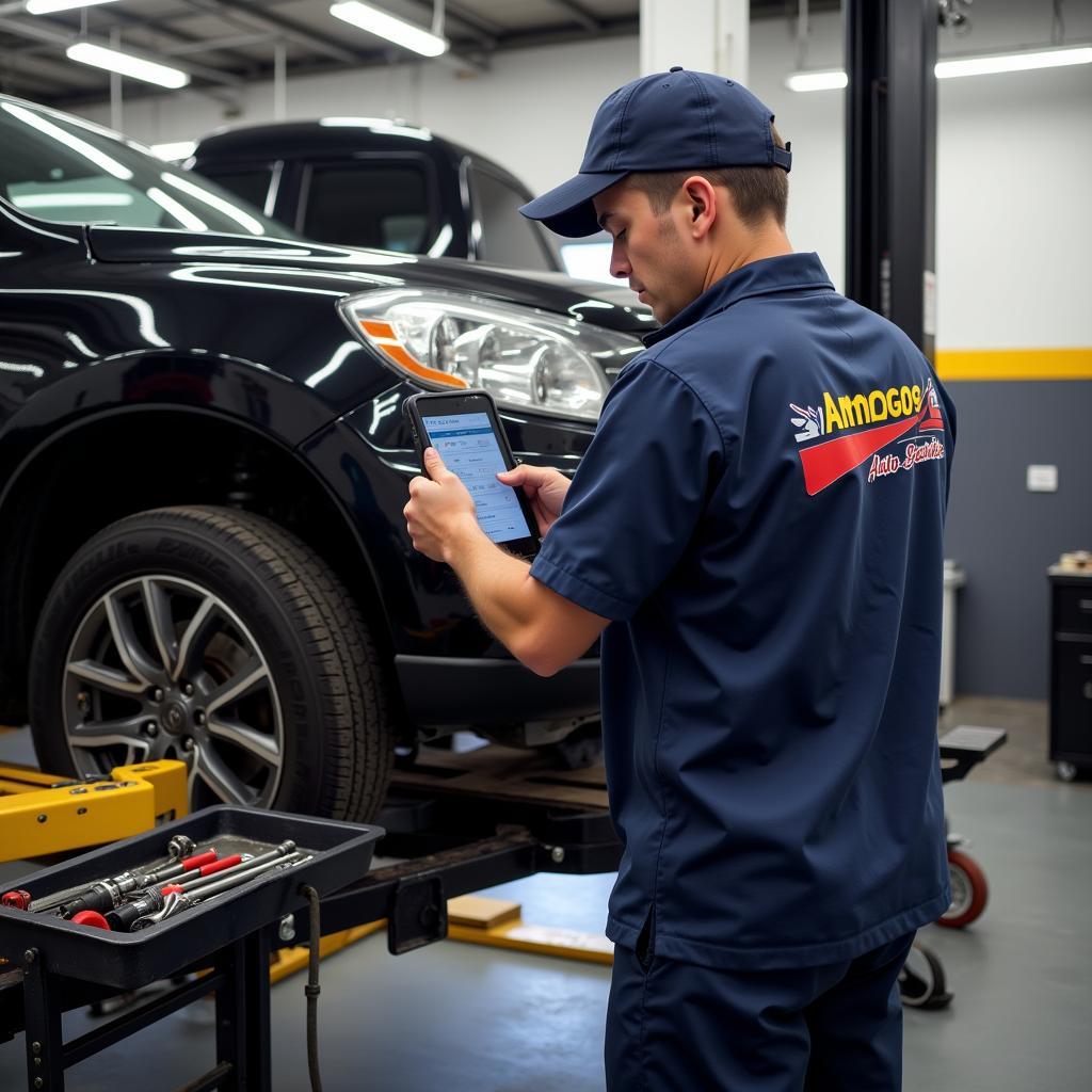 Mechanic Checking a Car in an Amigos Auto Service Center