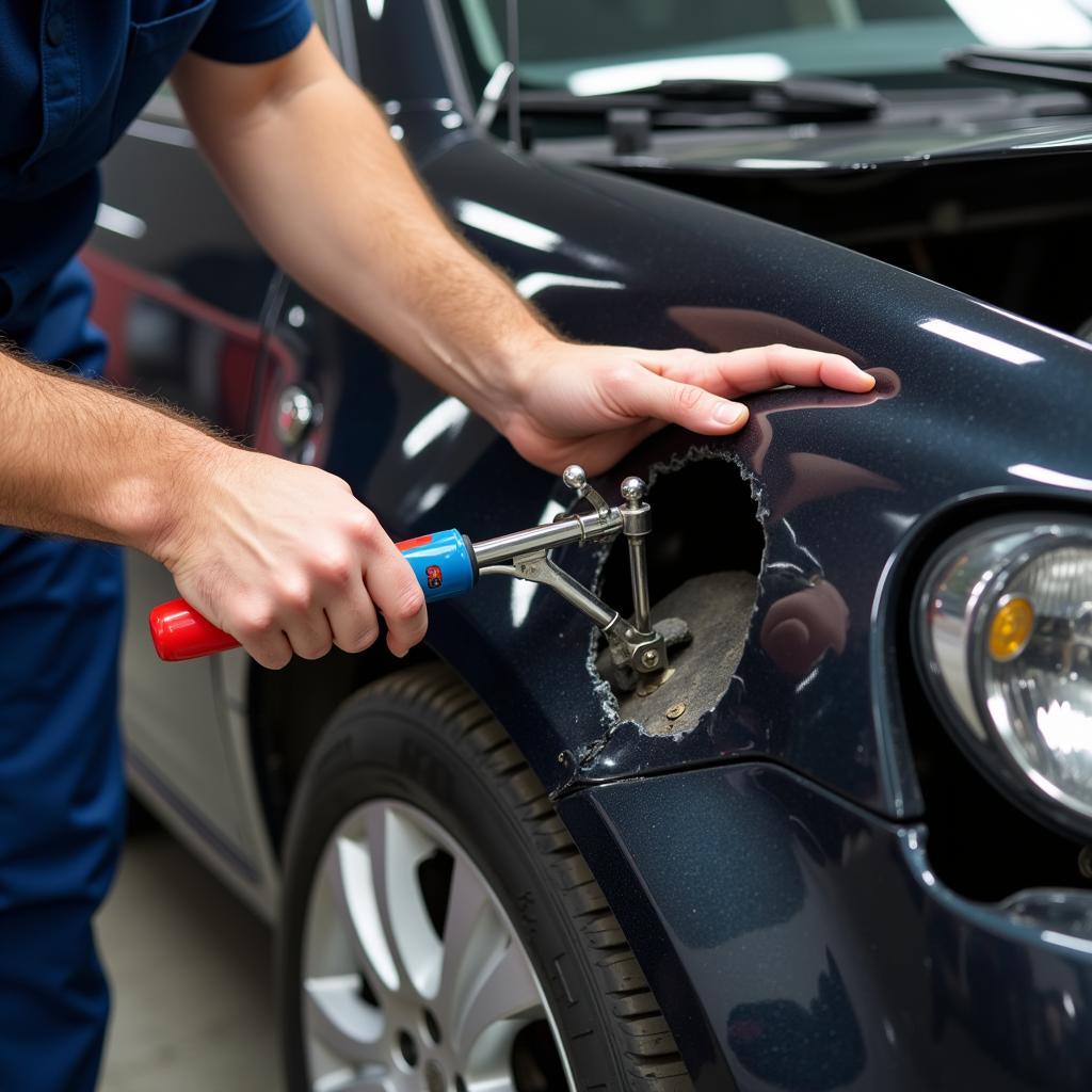 Inspecting a car frame for damage in Lake Worth