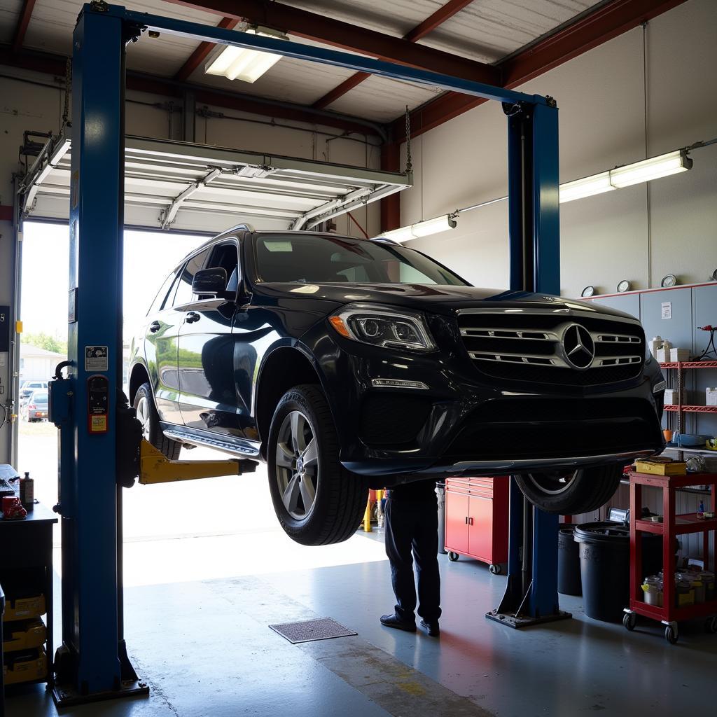 Car on Lift for Repair at Concord Auto Service