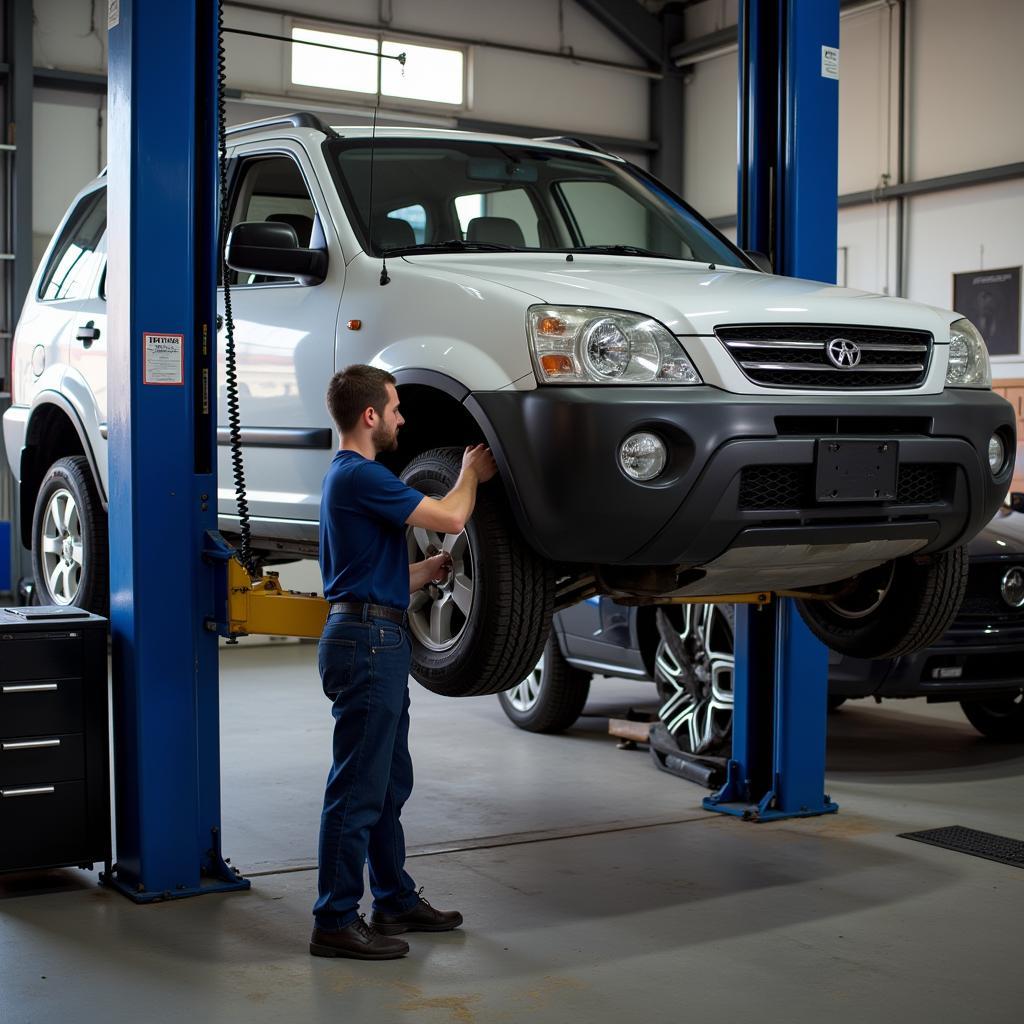 Car Undergoing Routine Maintenance at Auto Shop in Frederick, MD