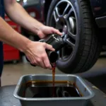 Routine Oil Change Being Performed in an Emporia KS Auto Shop