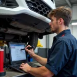 Jon's Auto Service Technician Working