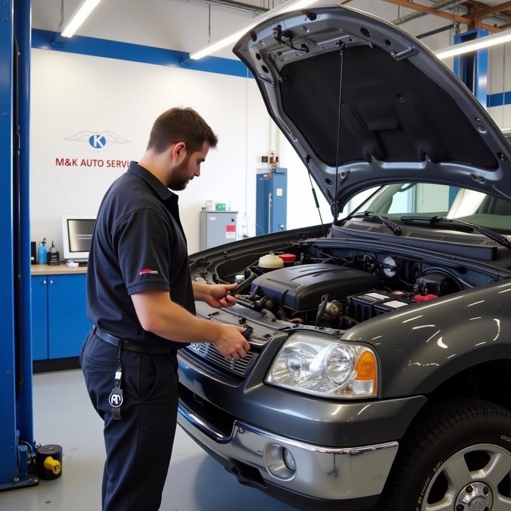 M&K Auto Service Performing Routine Maintenance