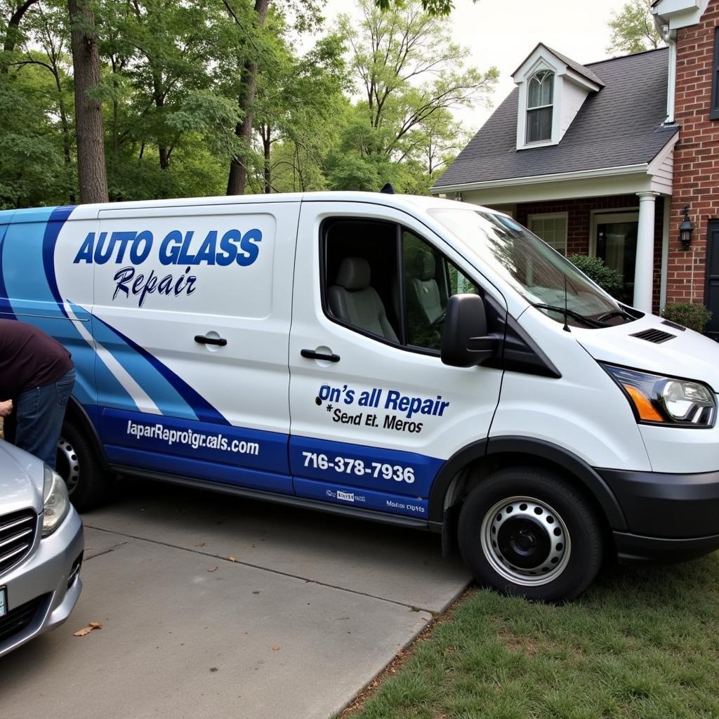 Mobile Auto Glass Repair Van Servicing a Car in a DeKalb County Driveway