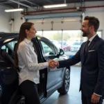 Satisfied Customer Picking Up Car from Service Center