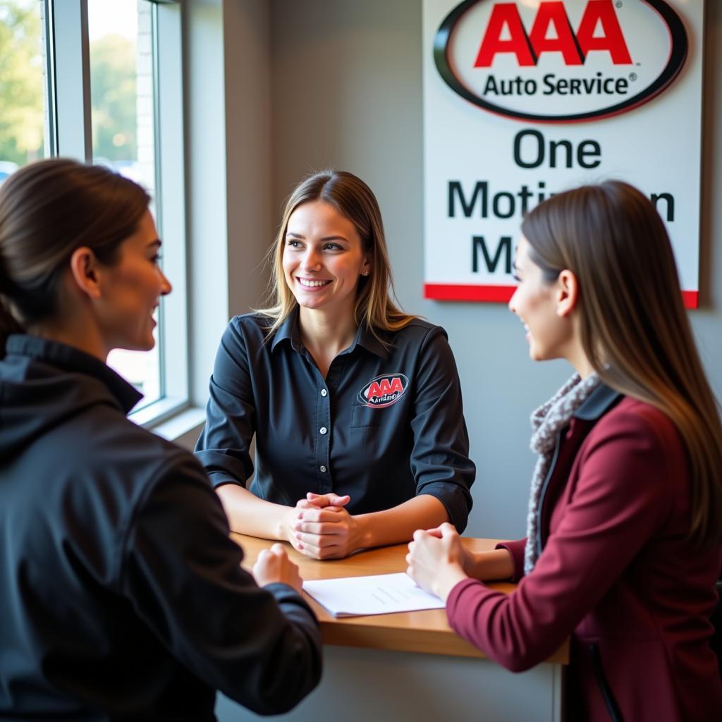 A friendly customer service representative assisting a client at AAA Auto Service Decatur GA