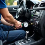 Car AC Service Technician Checking Refrigerant Levels