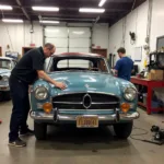 Classic Car Restoration in San Francisco: A vintage car being carefully restored in a San Francisco auto shop.