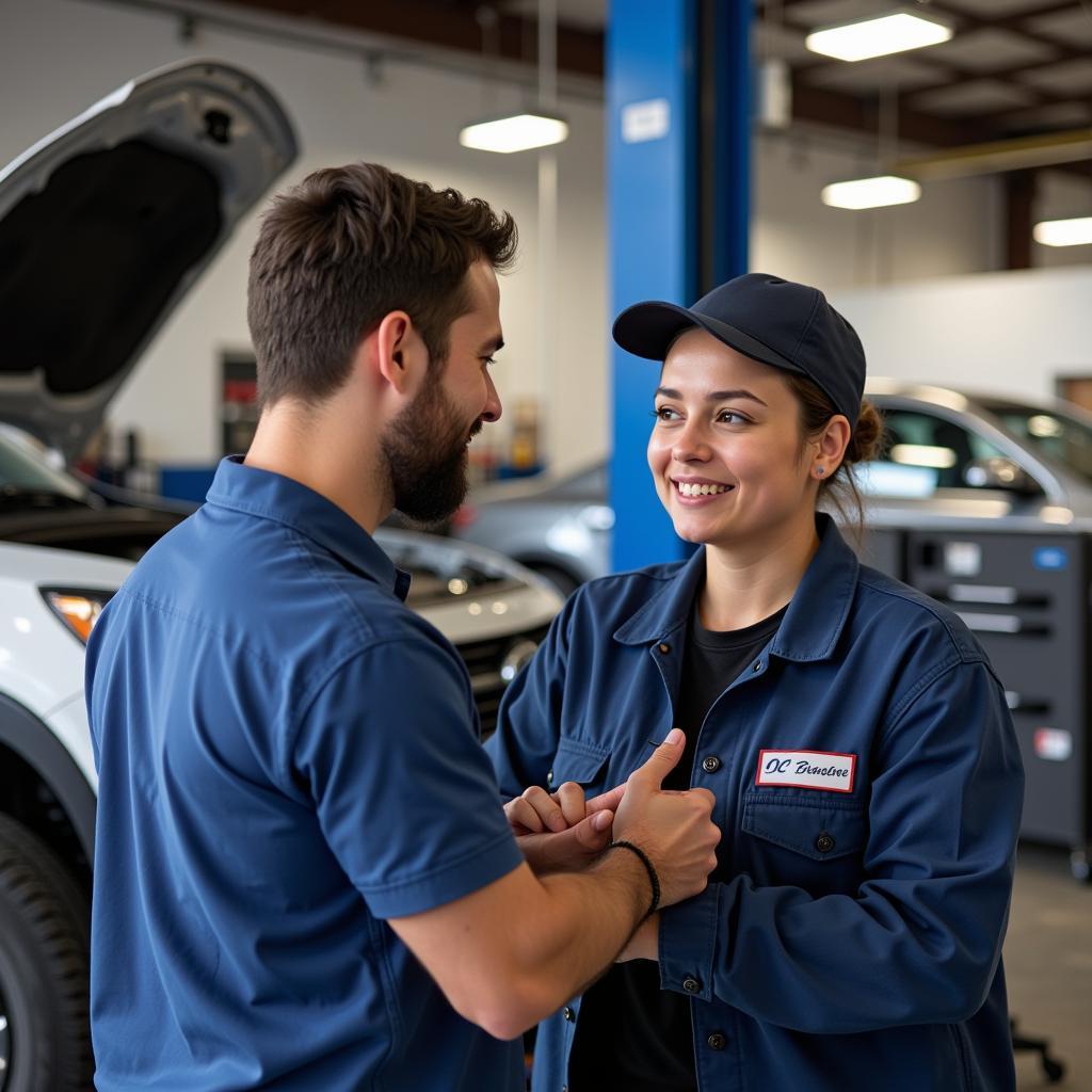 Local Mechanic Interacting with Customer