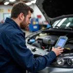 Mechanic Performing Car Diagnostics in Findlay