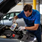 Valvoline Technician Performing an Oil Change